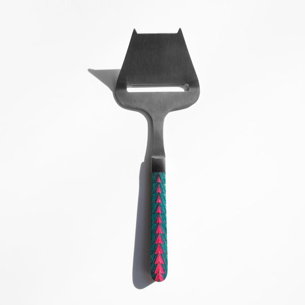 http://www.kindredblack.com/cdn/shop/products/Santa-Fe-Stoneworks-Kaleidoscope-Cheese-Slicer_grande.jpg?v=1512615628