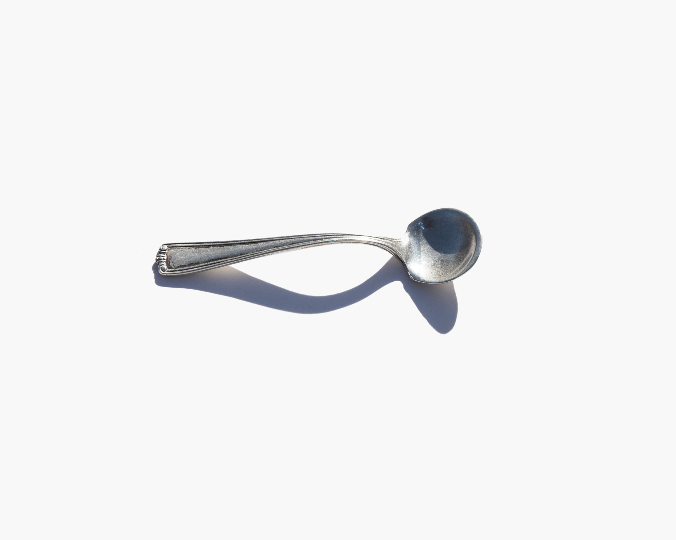 Sterling Mask Spoon