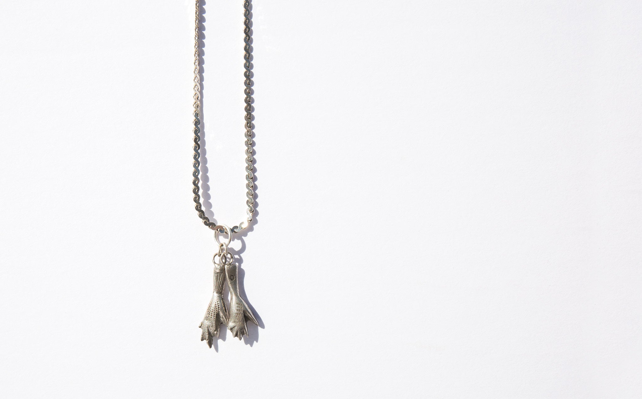 Iconic Chicken Feet Necklace with a single pendant, 925 silver