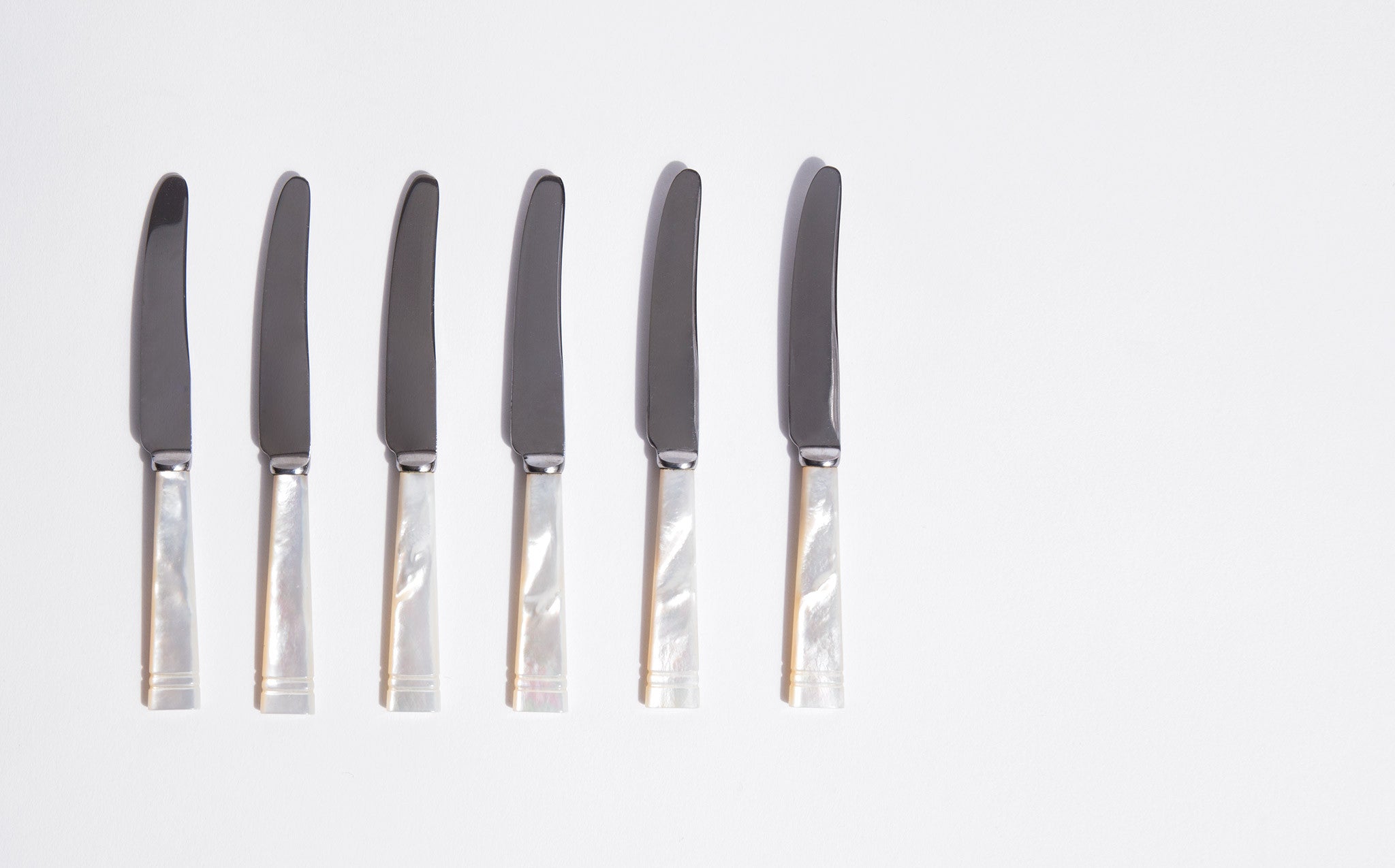 Stainless Steel Serrated Knives With Pearl Handle. Sheffield